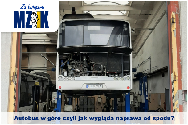 Grafika za kulisami z autobusem na podnośniku